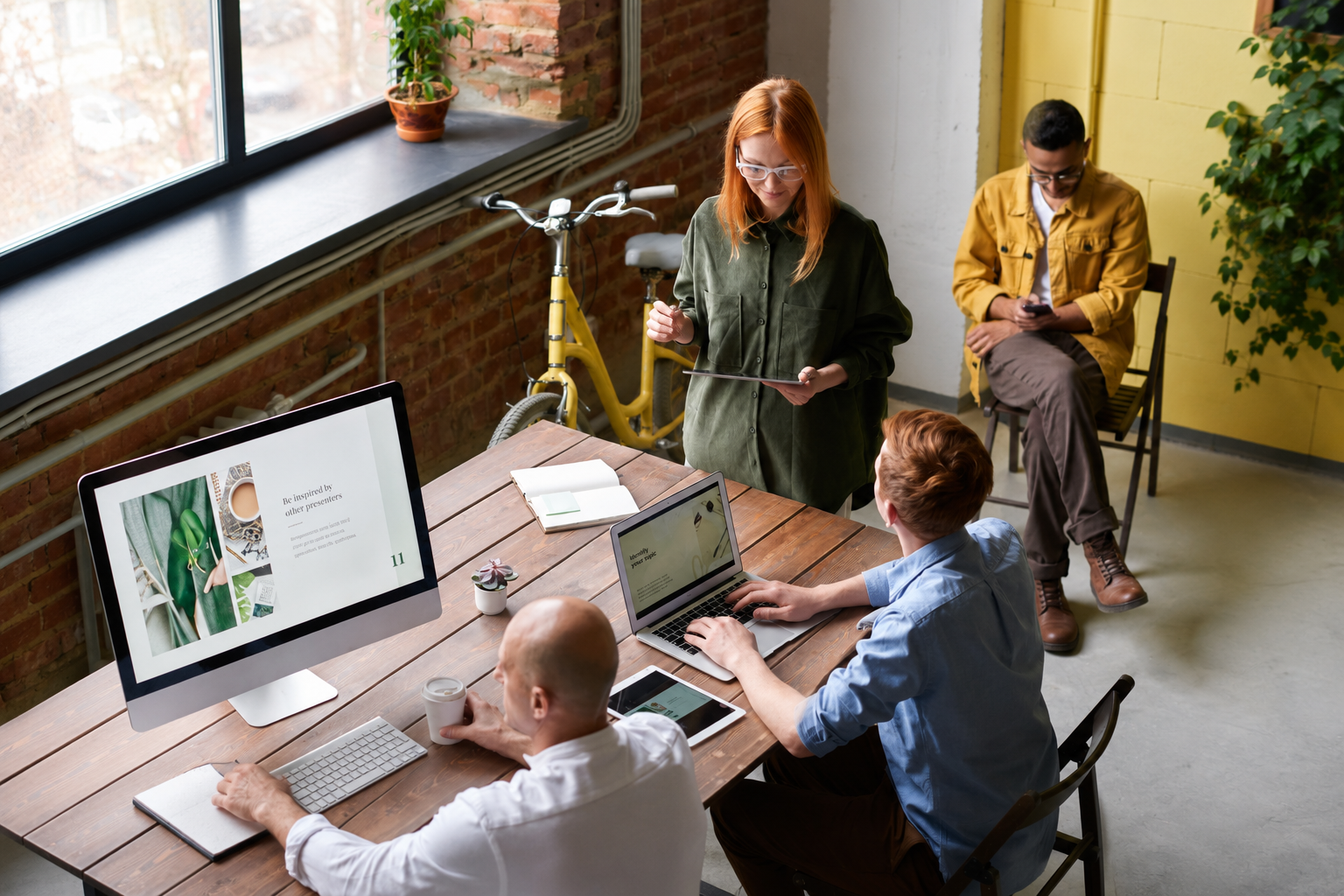 People working in the Blue Leaf Accounting office